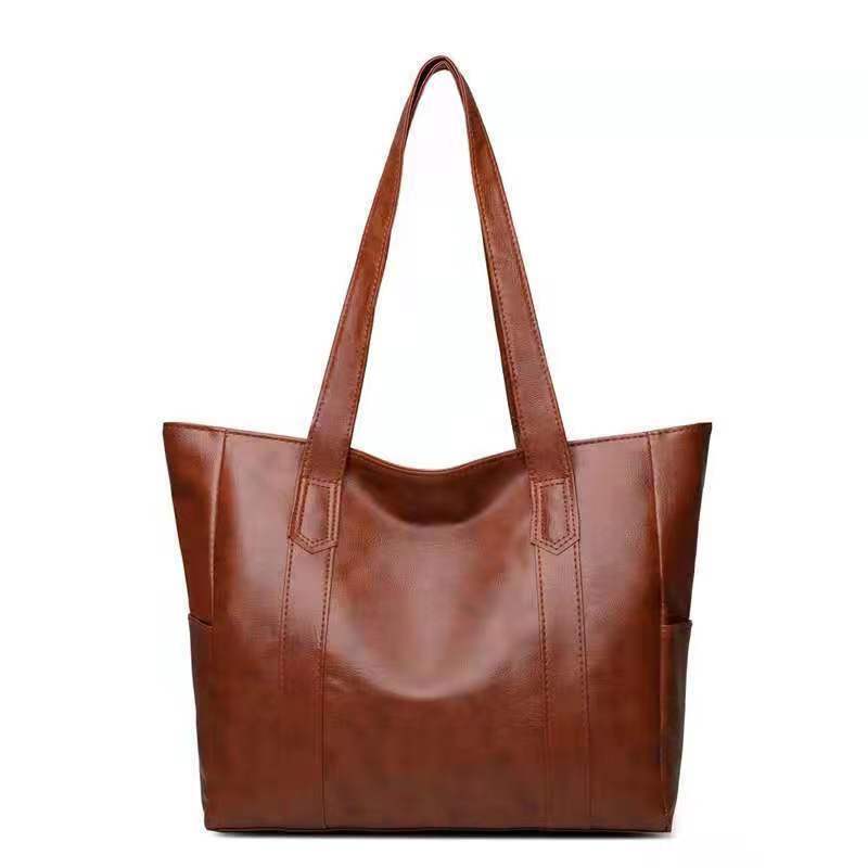 Elevate Your Style with Our Chic Women's Faux Leather Hobo Tote - Perfectly Spacious for Everyday Use in the UK